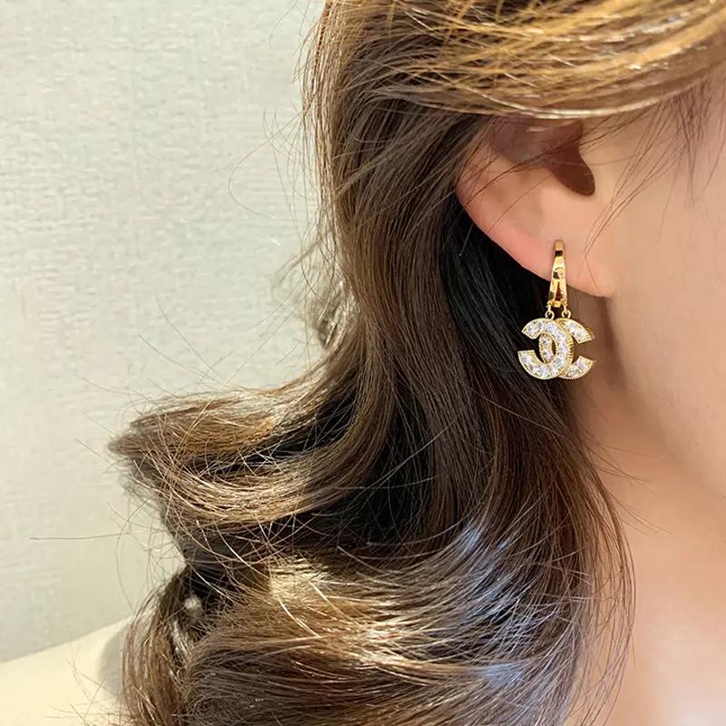 Céline Curve Earrings